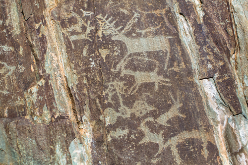 Ancient rock paintings - petroglyphs in the Altai Mountains, Russia.