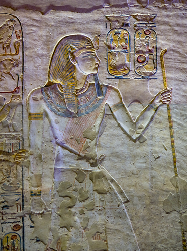 Ancient paintings and Egyptian hieroglyphs at the pharaoh tomb in the Valley of the Kings in Luxor, Egypt