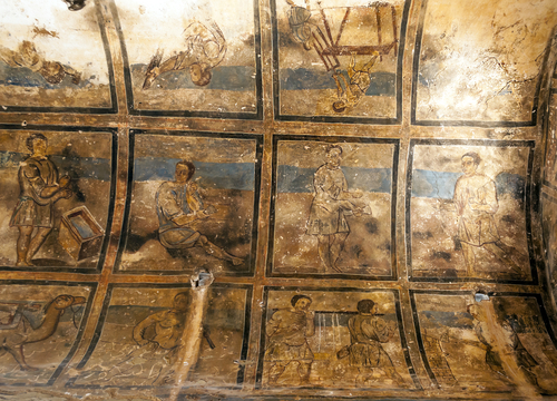 Texture of remains of ancient paintings on a wall.