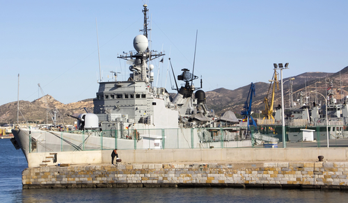 Modern warship with guns and anti submarine mines