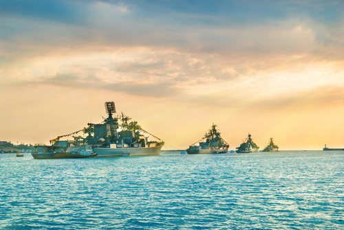Military navy ships in sea bay