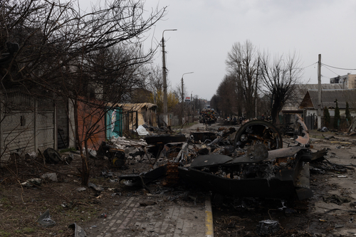 04-05-2022 destroyed russian war tanks and ammunition dumped in the streets of bucha, the place where the bucha battle took place, russian tanks were ambushed by the ukrainian army.
