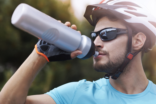 bicycle rider drinking water