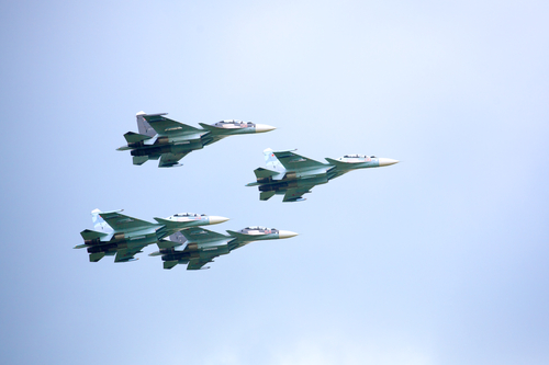Novosibirsk, Russia, July 31, 2016, Mochishche airfield, local air show, Aerobatic team VKS "Russian Falcons" Su-30 SM, four russian fighter aircrafts in the cloudy sky