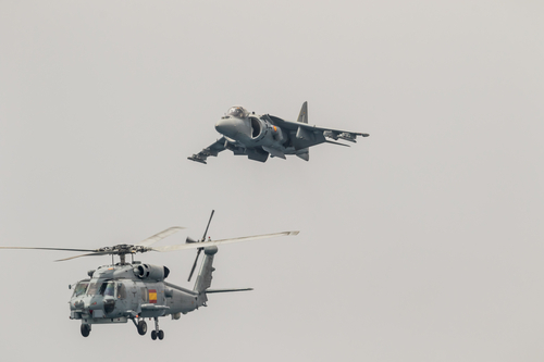 MOTRIL, GRANADA, SPAIN-JUN 09: Aircraft AV-8B Harrier Plus and  helicopter SH-60 Seahawk taking part in an exhibition on the 12th international airshow of Motril on Jun 09, 2017, in Motril, Granada, Spain