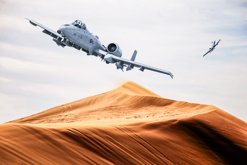 American warplane a10 flies over desert
