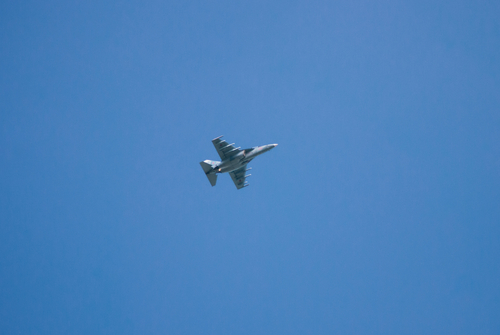 Russian fighter against a clear blue sky. Fighter aircraft sortie,