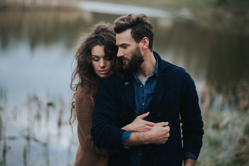 emotional man and woman sitting at the table conflict quarrel communication