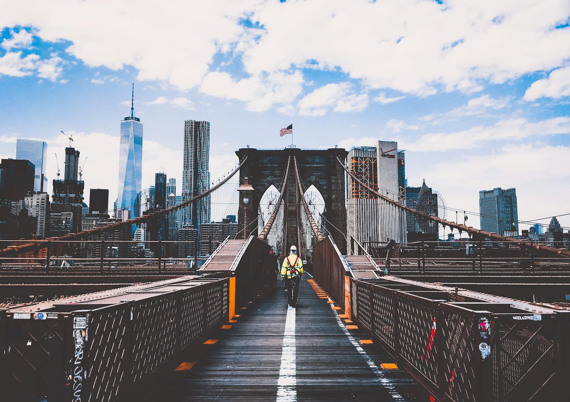 man walking on bridge