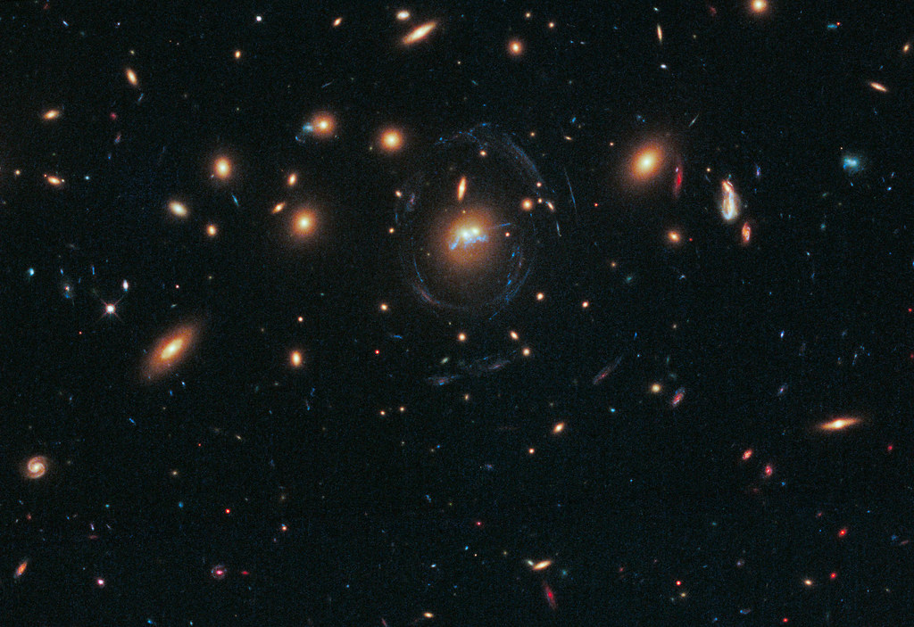 Hubble Sees Spiral Bridge of Young Stars Between Two Ancient Galaxies