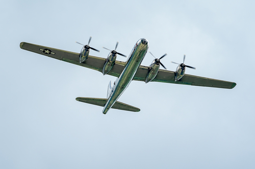 Oshkosh, WI - 28 July 2018:  A B-29 Superfortress bomber flying around, demostrating power from over 60 years ago.