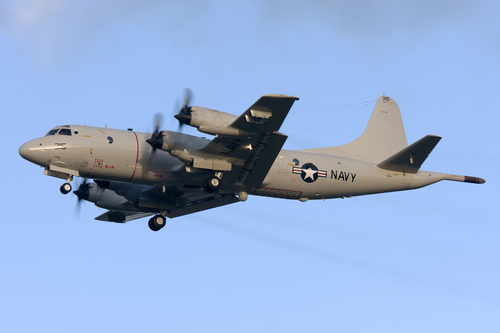 Luqa, Malta December 16, 2011: US Navy Lockheed P-3C Orion performing some missed approaches on runway 31.