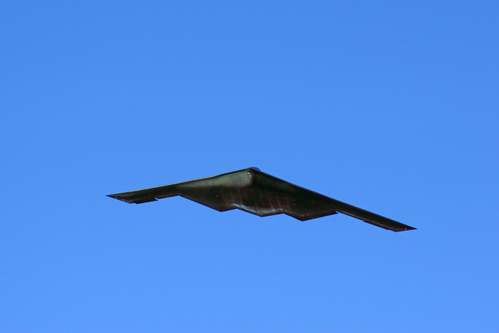 Airplane B-2 Stealth Bomber flying over 2016 Rose Parade New Years Day in Pasadena, California