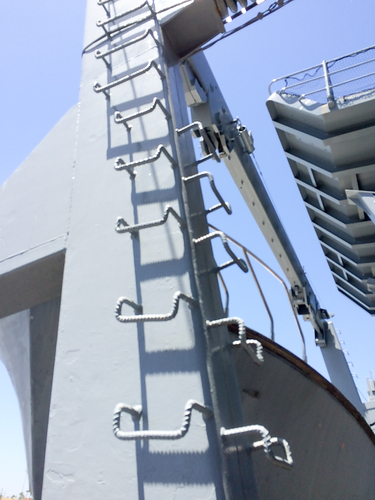 Steel metal ladder climbing up concept