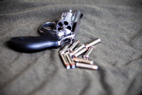 .357 magnum revolver stainless steel hand gun on cloth background