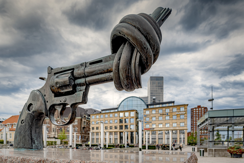 MALMO, SWEDEN - AUGUST 21, 2020: The Knotted Gun, is a bronze sculpture by Swedish artist Carl Fredrik Reuterswaerd of an oversized Colt Python 357 Magnum revolver with its muzzle tied in a knot.