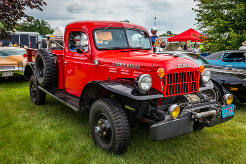Iola, WI - July 07, 2022: High perspective front corner view of a 1949 Dodge Power Wagon 1 Ton Pickup Truck at a local car show.