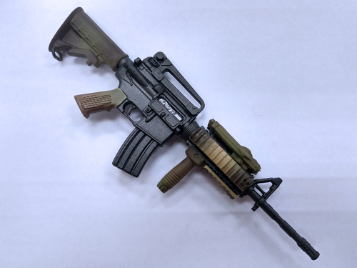KUALA LUMPUR, MALAYSIA -JUNE 09, 2018: Plastic model of military automatic gun in small scale. Sale as a collector item for military gear collector and hobbyist. 
