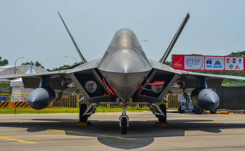 Singapore - Feb 10, 2018. Lockheed Martin F-22 Raptor aircraft belong to the US Air Force sits on display in Changi, Singapore.