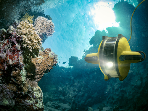 Underwater robot explores the deep sea - This image is an illustration