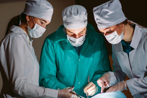 The surgeon and his assistants makes an operation.