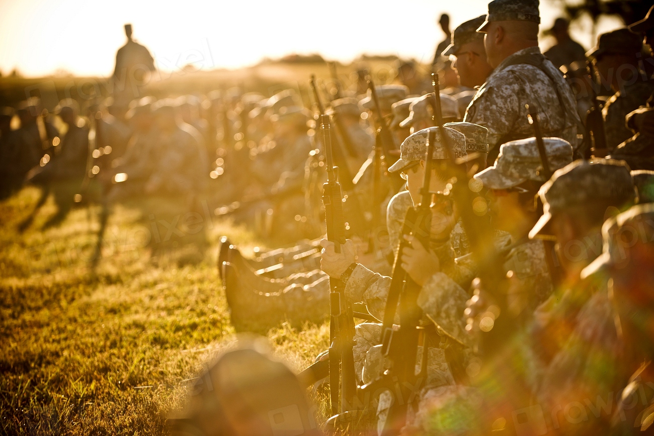 U.S. Soldiers listen during a rifle
