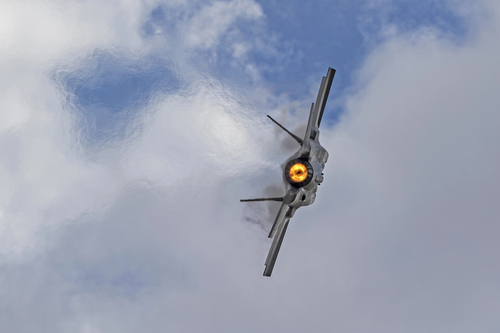 Airplane F-35 Lightning modern stealth jet fighter flying at the 2017 Planes of Fame Air Show