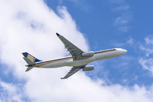 Ho Chi Minh City, Vietnam - September 1st, 2019: Airplane Airbus A330 of Singapore Airlines flying through clouds sky take off from Tan Son Nhat International Airport, Ho Chi Minh City, Vietnam